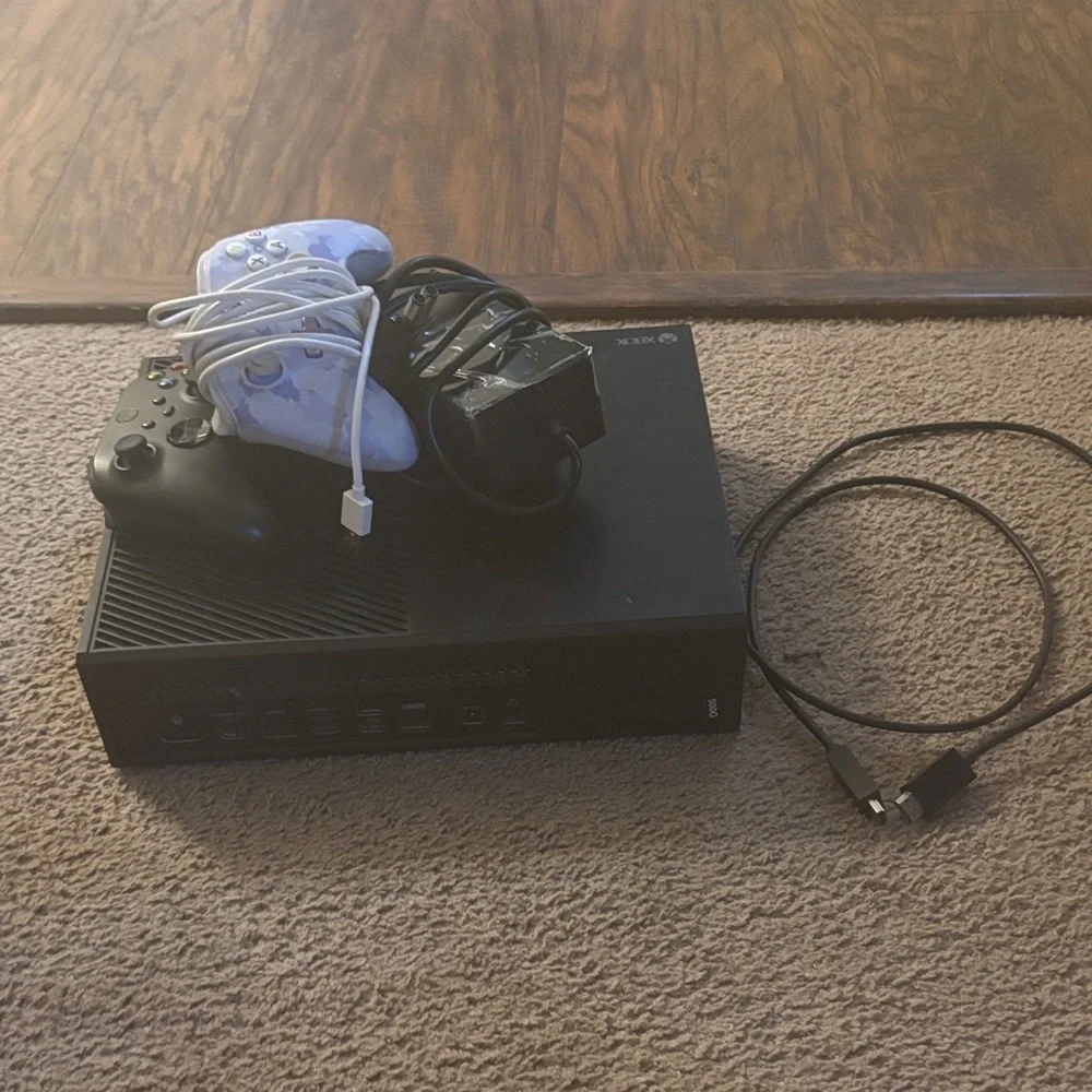 One Black Console Bundle with Black and White Controllers